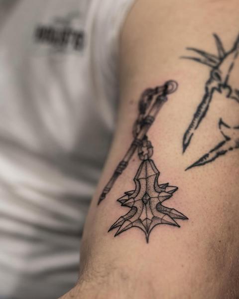 Linework spiked mace tattoo by @griff.tattoo
