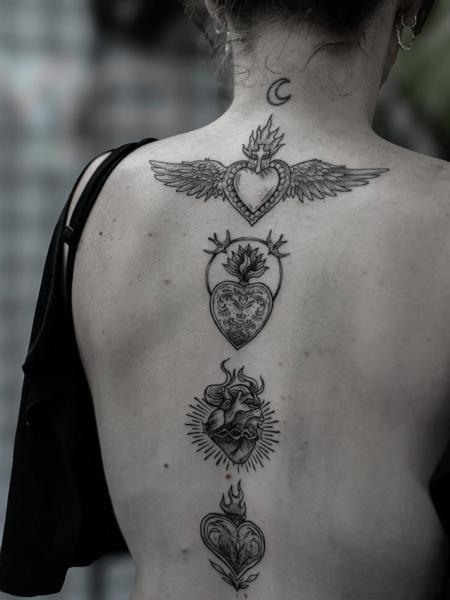 Blackwork sacred hearts tattoo by @griff.tattoo