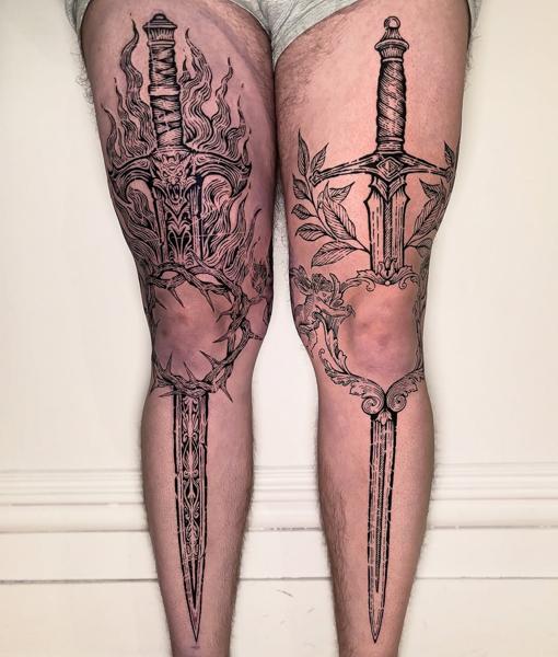 Ornamental ornamental swords tattoo by @goh_w_h.tattoo
