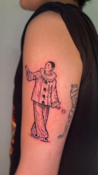 Fine line pierrot clown tattoo by @goh_w_h.tattoo