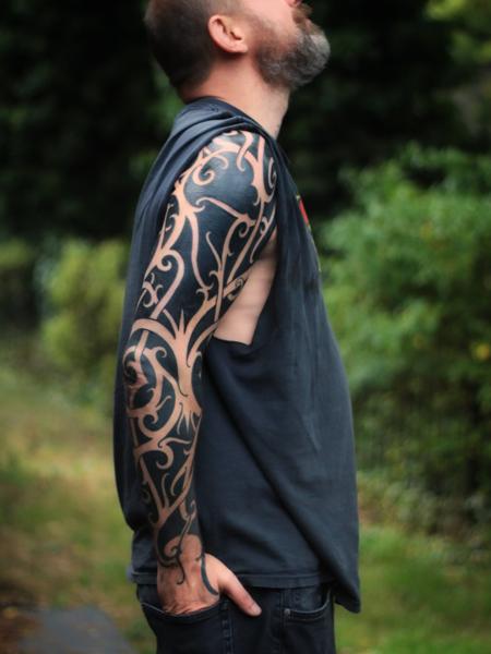 Tribal tribal sleeve tattoo by @hanumantra