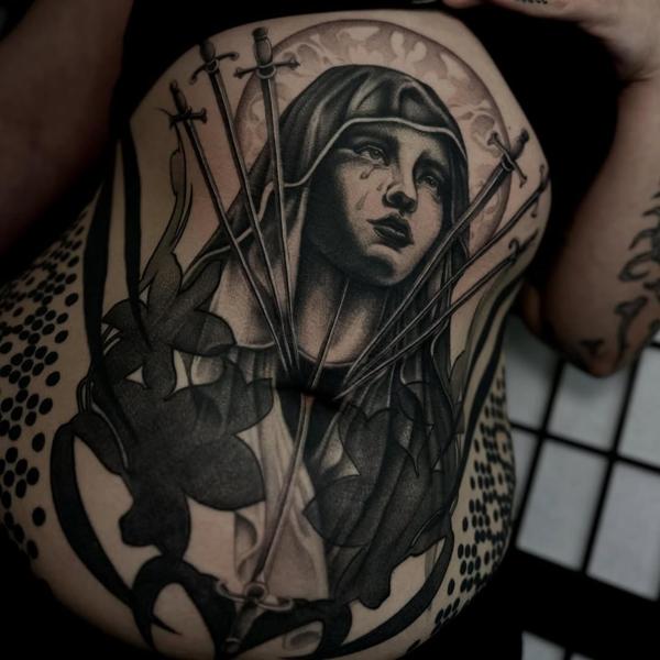 Blackwork swords and crying woman tattoo by @mystickyfingers_