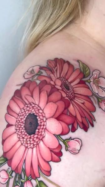 Realism floral bouquet tattoo by @hattiejcox_tattoo
