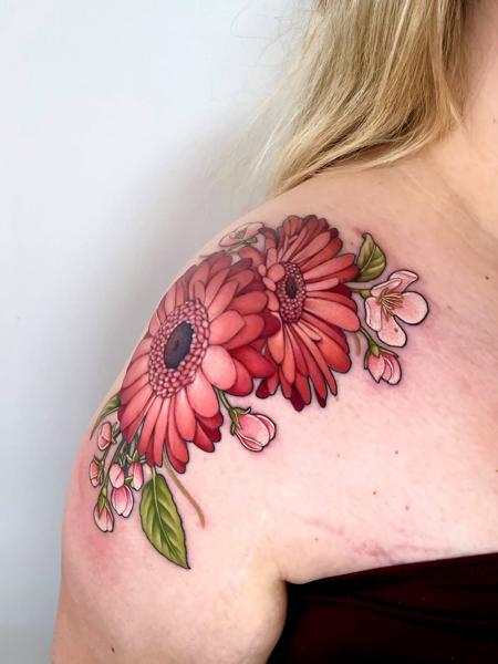 Realism floral bouquet tattoo by @hattiejcox_tattoo