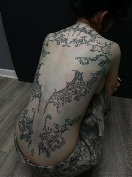 Blackwork ornamental patterns tattoo by @vohmitatt_
