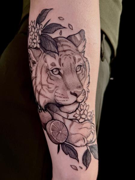 Dotwork tiger with flowers tattoo by @helle.ink
