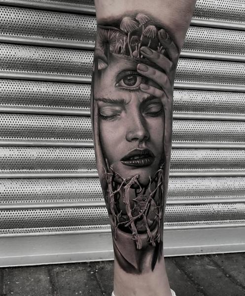 Realism surreal woman portrait tattoo by @hellekarger_tattoo