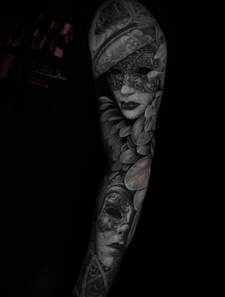 Realism venetian masks tattoo by @hellekarger_tattoo