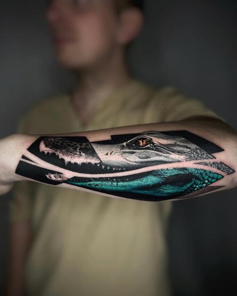 Realism with abstract elements alligator head tattoo by @hermit_ttt