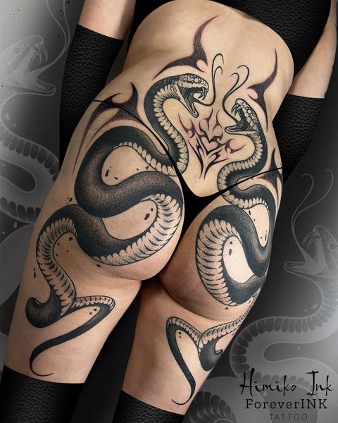 Blackwork dual snakes tattoo by @himiko.ink