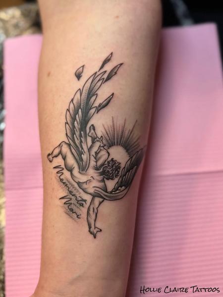 Fine line winged figure tattoo by @hollieclairetattoos