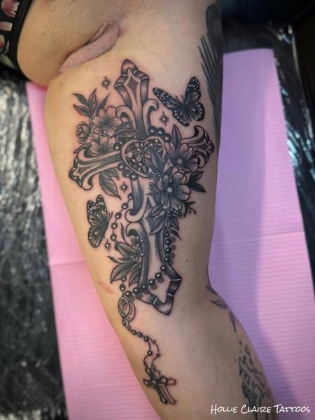 Blackwork floral cross tattoo by @hollieclairetattoos