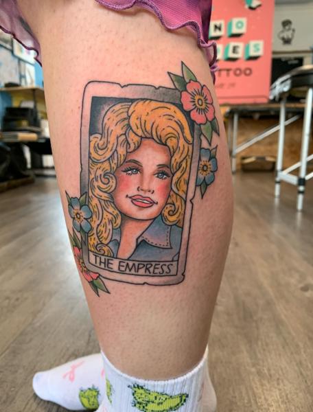 Traditional portrait card tattoo by @hollielimertattoo