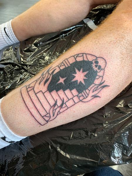 Traditional skull coffin tattoo by @hollielimertattoo