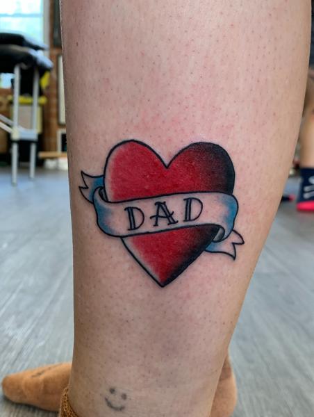 Traditional heart banner tattoo by @hollielimertattoo