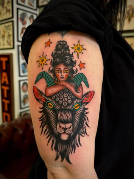 Traditional woman and goat tattoo by @hollyashbytattoo