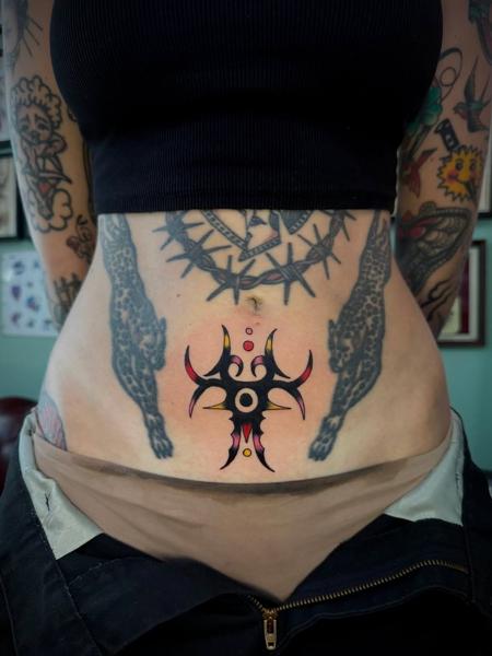 Tribal tribal symbol tattoo by @hollyashbytattoo