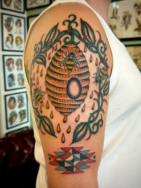 Traditional beehive and bees tattoo by @hollyashbytattoo