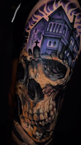 Realism haunted house skull tattoo by @honey.scarheart