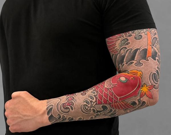 Japanese koi fish tattoo by @holyfoxtattoos