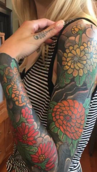Japanese floral sleeve tattoo by @iamthecobra