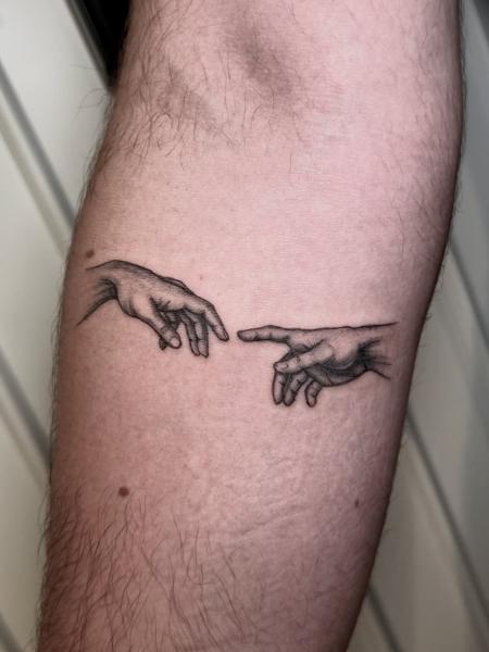 Fine line creation hands tattoo by @illytattoo
