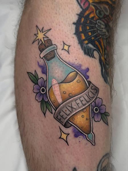 Traditional felix felicis potion tattoo by @illytattoo