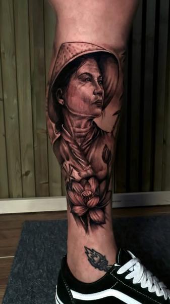 Realism woman with hat tattoo by @ilias_lab