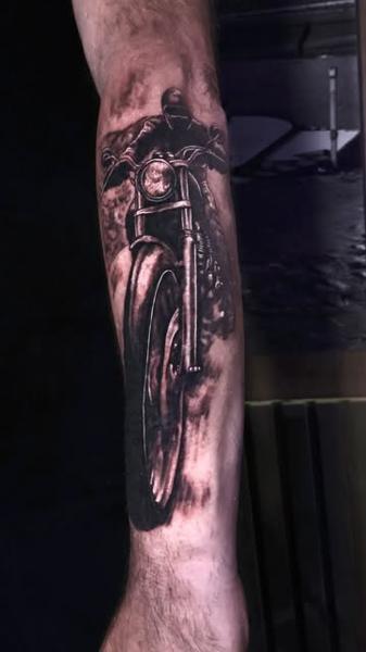 Realism motorcycle rider tattoo by @ilias_lab