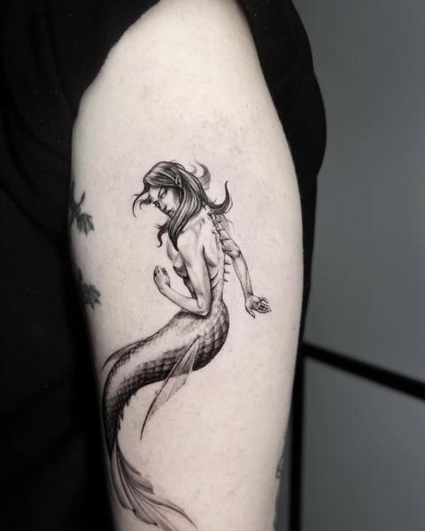 Illustrative blackwork melancholy mermaid tattoo by @60needle