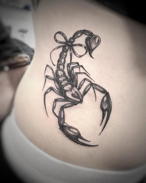 Illustrative scorpion with bow tattoo by @60needle