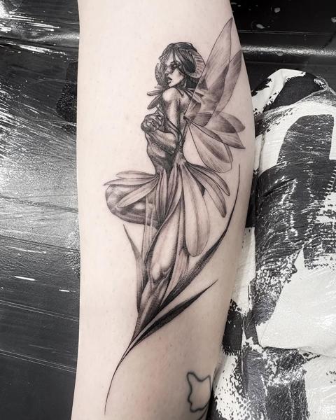 Illustrative blackwork horned fairy tattoo by @60needle