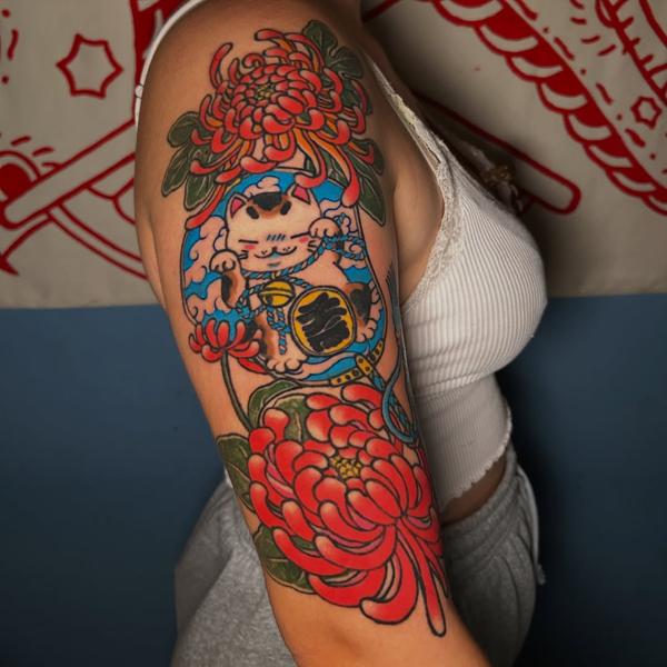 Japanese lucky cat tattoo by @ziggi_tattoos