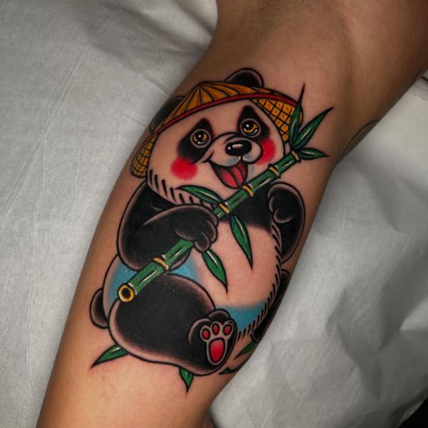 Traditional panda with bamboo tattoo by @ziggi_tattoos
