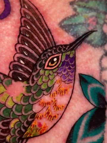 Realism colorful hummingbird tattoo by @inmatattooartist