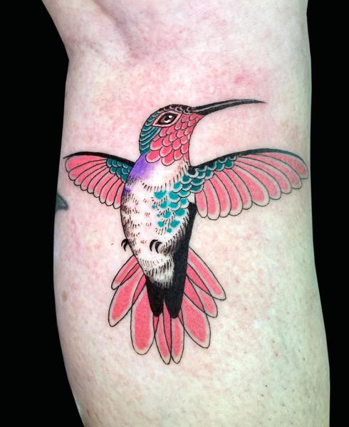 Traditional hummingbird tattoo by @inmatattooartist