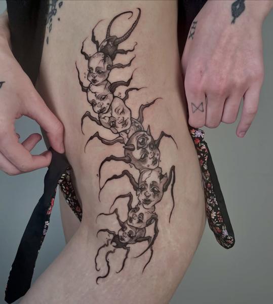Illustrative doll centipede tattoo by @dollmadaki.tattoos