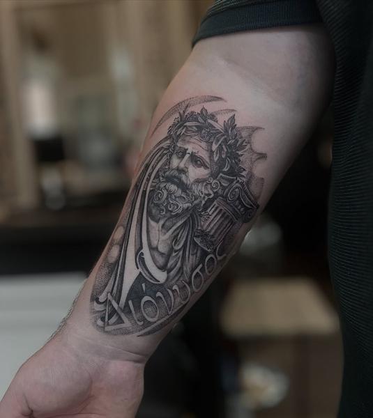 Realism greek god portrait tattoo by @steinbach_art