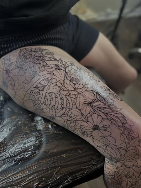 Fine line floral large floral tattoo by @steinbach_art