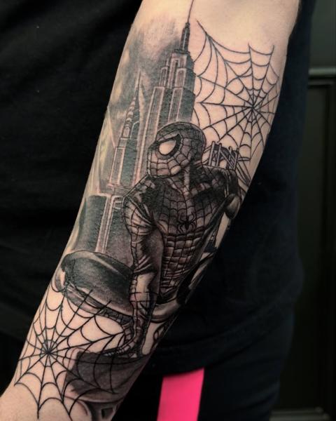 Comic book realism spider-man city tattoo by @jacoby_tattoo