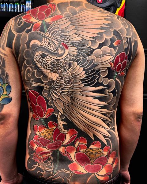 Japanese traditional crane lotus tattoo by @jacoby_tattoo