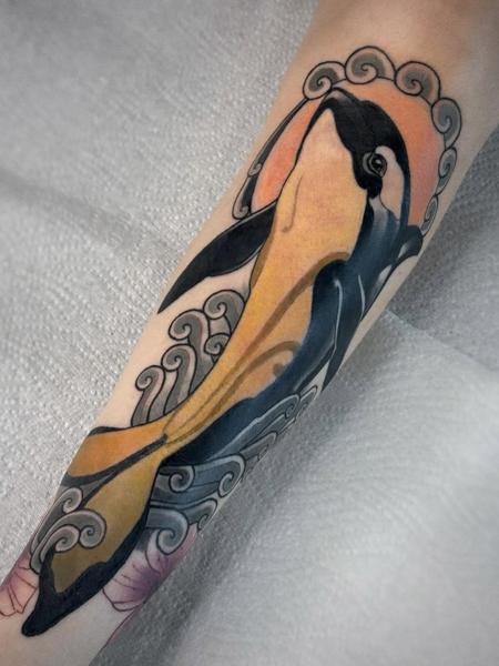Illustrative color stylized orca tattoo by @jadee.tattoo