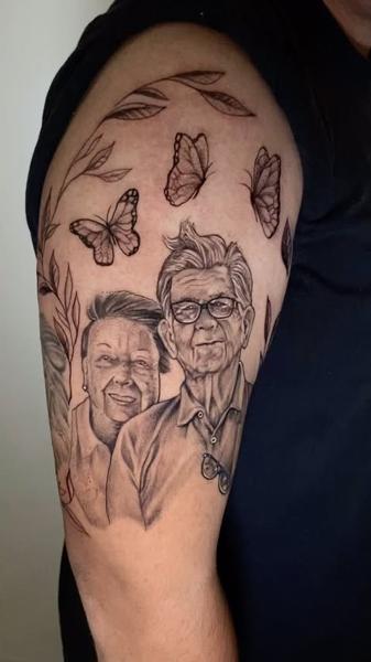 Realism portrait with butterflies tattoo by @jaimikotattoo