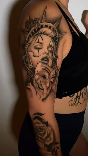 Realism statue liberty woman tattoo by @jaimikotattoo