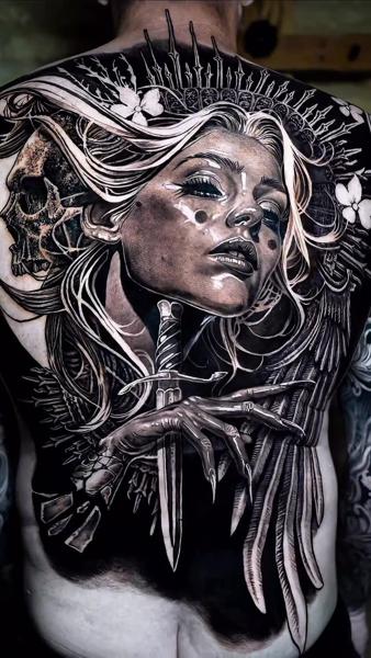 Realism woman with dagger tattoo by @jakconnollyart