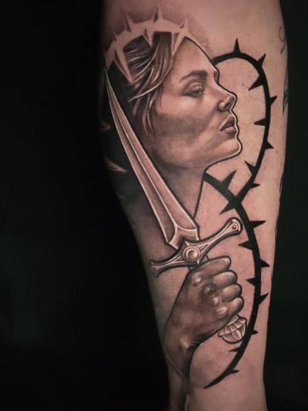 Dark realism woman dagger thorns tattoo by @jakebarneyfromstatefarm