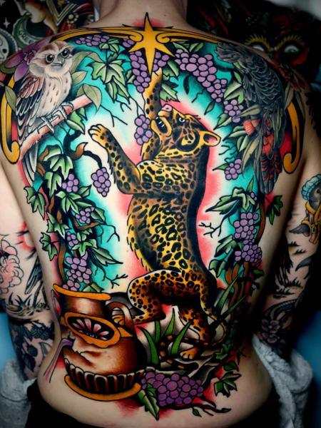 Neo-traditional leopard grapes owl tattoo by @straats_tatts