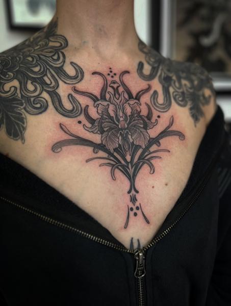 Blackwork ornamental flower tattoo by @callmenighthawkk
