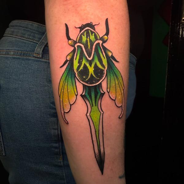 Neo-traditional beetle dagger tattoo by @jammersink