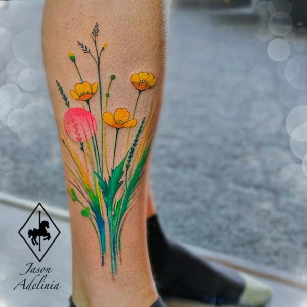 Watercolor wildflowers tattoo by @jason_adelinia